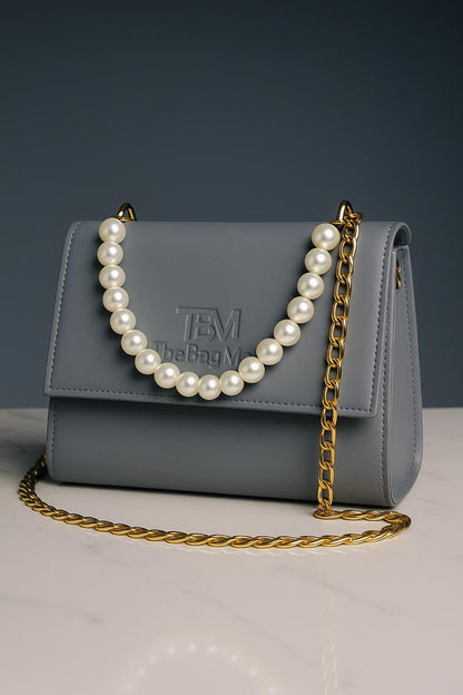 The Bag Mode (TBM) Elegant Black Leather Handbag with Pearl and Gold Chain Accents