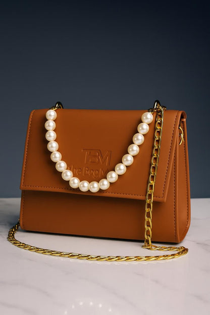 The Bag Mode (TBM) Elegant Black Leather Handbag with Pearl and Gold Chain Accents